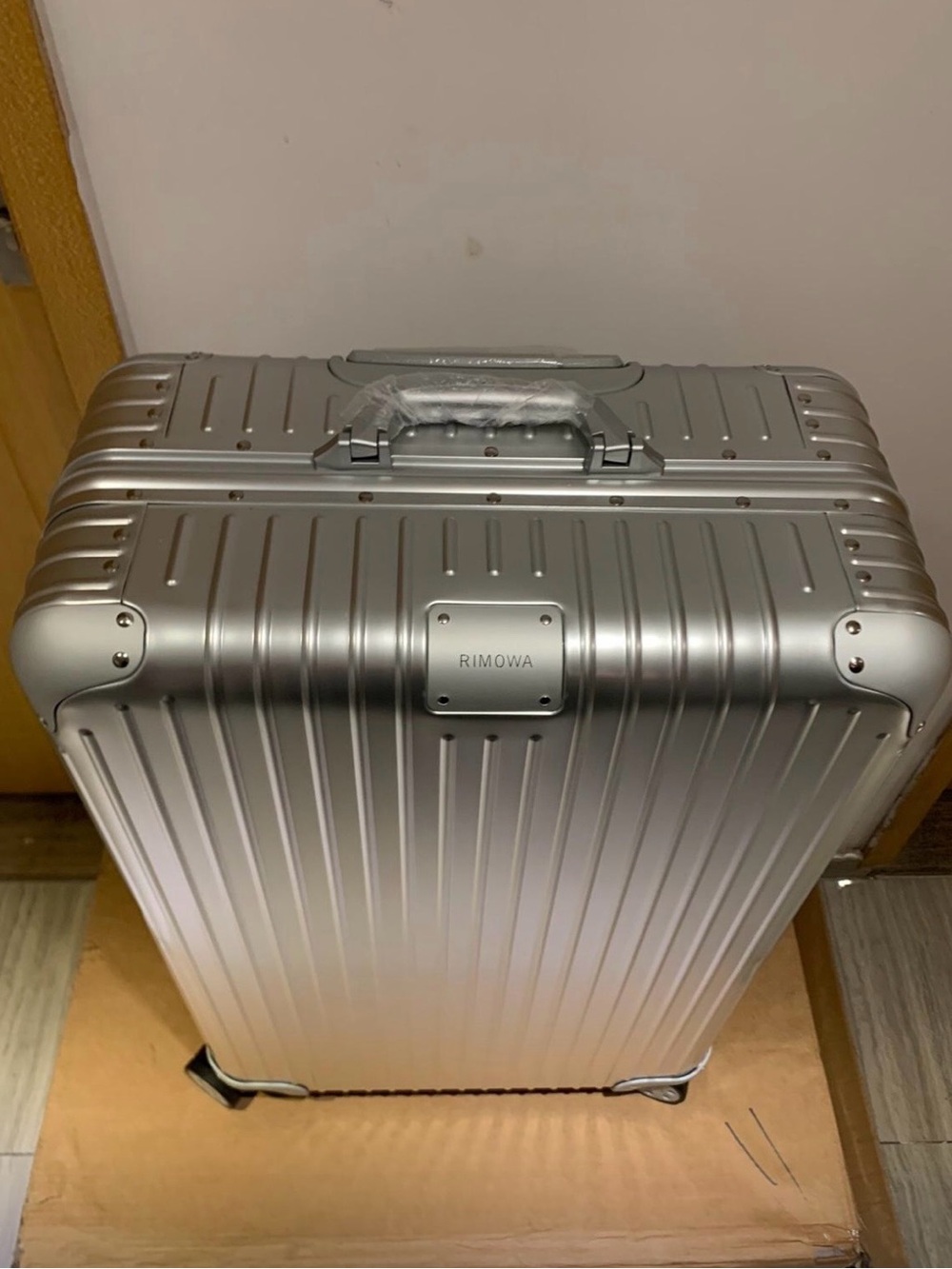Silver rimowa suitcase